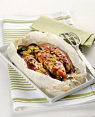 Red mullet with pine nuts in parchment paper