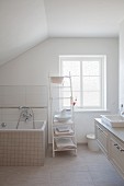 Attic bathroom with vintage ambiance