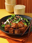 Fried tempeh with salad