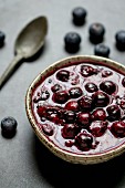 A bowl of blueberry sauce