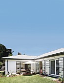 Open terrace doors leading onto terrace of renovated bungalow