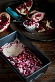 Homemade pomegranate ice cream in a loaf tin