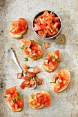 Bruschetta (grilled bread topped with tomato and basil, Italy)