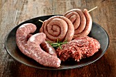 Raw minced beef and sausages