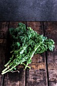 Fresh kale on a wooden surface