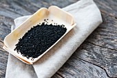 Black cumin on a rectangular dish