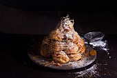 A croquembouche with icing sugar