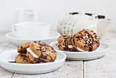 Chocolate biscuits with hazelnuts filled with quark