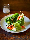 Savoy cabbage wraps with beetroot, peppers and sheep's cheese