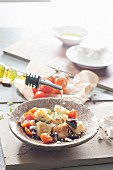 Fried gnocchi with aubergines and tomatoes