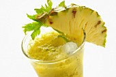 A pineapple shot in a glass (close up)