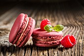Raspberry macaroons on a wooden table