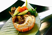 Grilled lobster tail on a banana leaf (Asia)