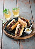 Hot dogs with caramelised onions and mastered