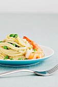 Angel hair pasta with peas and prawns
