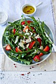 Rocket salad with strawberries and Parmesan cheese