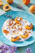 Baked apricot halves on lavender and coconut cream with crunchy quinoa
