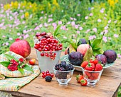 An arrangement of fruit on a garden table