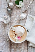 Estonian apple soup with meringue, cream and almonds