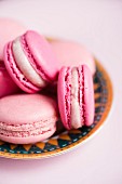 Pink strawberry and raspberry macaroons (close-up)