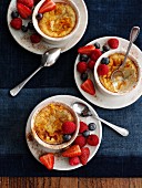 Baked egg custard with berries (England)