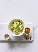 Cabbage salad with cucumber and a peanut sauce (Asia)