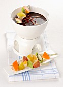 Chocolate fondue with fruit kebabs