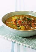 Potato and curry soup with lamb