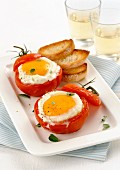 Tomatoes with fried eggs