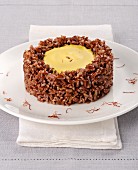Red rice with a saffron cheese cream