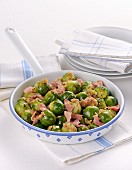 Fried Brussels sprouts with ham