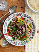 Summer salad with vegetables and grilled beef