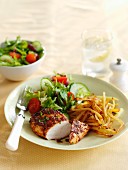 Tomato and basil chicken with chips and salad