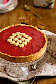 Rose tart on a cake stand