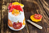 Chia pudding with orange and grapefruit slices in a glass