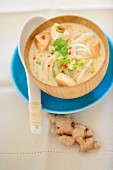 Ginger soup with rice noodles and salmon (Asia)
