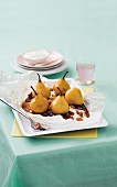 Pears with raisins in parchment paper
