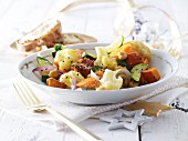 Warm vegetable salad with goat's cheese croutons