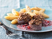 Wild boar fillet with a walnut crust and pomegranate sauce