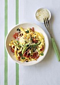 Pasta with bacon, avocado and cherry tomatoes