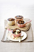 Pear and nut puddings with cinnamon and vanilla sauce