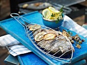 Grilled seabream with an olive and tomato filling