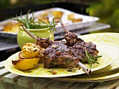 Marinated lamb chops with lemon potatoes from a barbecue