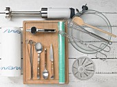 Various kitchen utensils for cooking and grilling