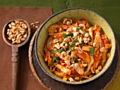 Spicy white cabbage with tomatoes and peanuts