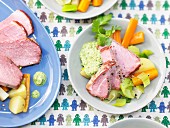 Roast gammon with fresh vegetables and herb sauce