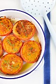 Gratinated tomatoes with breadcrumbs, herbs and Parmesan cheese