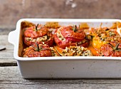 Oven-baked stuffed tomatoes and peppers