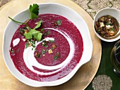 Beetroot soup with apple and hazelnut gremolata