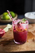 A pomegranate mojito with crushed ice